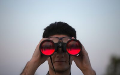 Man with binoculars